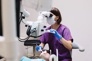 Patient asking the dentist questions during an exam